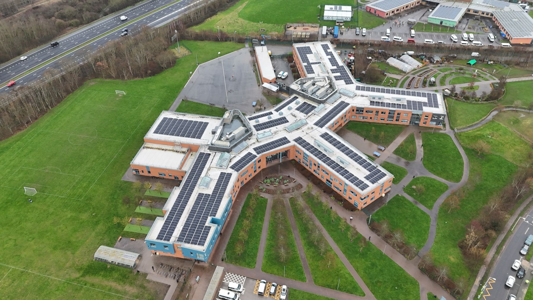 Aerial view of solar panels on a school